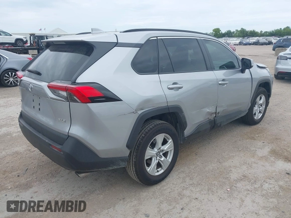 2020 Toyota RAV4 XLE with VIN 2T3W1RFV4LW094687, listed as a IAAI auction lot 42652039 with 56,693 mi miles and . Bid and sale history available at DreamBid. Image 4.