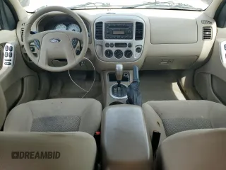2005 Ford Escape XLT with VIN 1FMYU03165KC03784, listed as a Copart auction lot 64299225 with 185,033 mi miles and Salvage title. Bid and sale history available at DreamBid. Image 8.