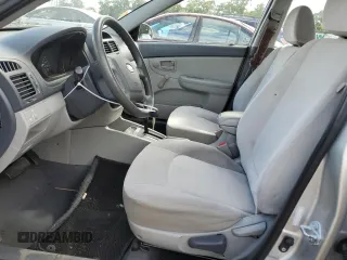 2009 Kia Spectra EX with VIN KNAFE221695615873, listed as a Copart auction lot 67671454 with 135,300 mi miles and Salvage Title. Bid and sale history available at carsss.com. Image 7.