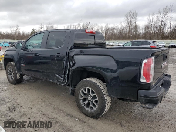 2022 GMC Canyon 4WD AT4 w/Leather with VIN 1GTG6FEN5N1279158, listed as a Copart auction lot 50958545 with 34,569 mi miles and Salvage Title. Bid and sale history available at carsss.com. Image 2.