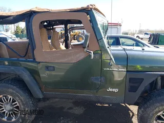 1998 Jeep Wrangler SE with VIN 1J4FY29P6WP709203, listed as a IAAI auction lot 41962877 with 1 mi miles. Bid and sale history available at carsss.com. Image 12.
