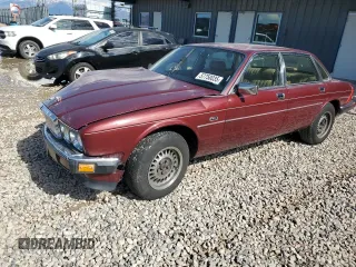 1988 Jaguar XJ z VIN SAJHV1647JC550298, wystawiony jako Copart lot #57750035 z przebiegiem Nie podano mil oraz Szkoda całkowita • Salvage title. Historia ofert i sprzedaży dostępna na DreamBid. Obrazek 1.
