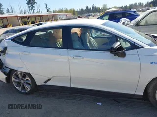 2019 Honda Clarity with VIN JHMZC5F1XKC007033, listed as a IAAI auction lot 42064611 with 28,458 mi miles. Bid and sale history available at carsss.com. Image 13.