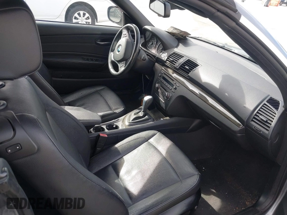 2012 BMW 1 Series 128i with VIN WBAUN1C52CVR00421, listed as a IAAI auction lot 41594256 with 107,957 mi miles and . Bid and sale history available at DreamBid. Image 5.