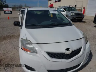 2009 Toyota Yaris with VIN JTDBT903991303431, listed as a IAAI auction lot 41794505 with 183,917 mi miles. Bid and sale history available at carsss.com. Image 6.