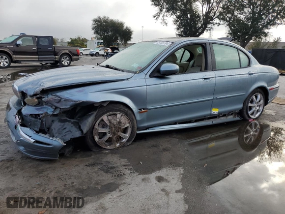 2004 Jaguar X-Type z VIN SAJEB52D54XD68737, wystawiony jako Copart lot #85168784 z przebiegiem 150 975 mil mil oraz Szkoda całkowita • Salvage title. Historia ofert i sprzedaży dostępna na DreamBid. Obrazek 1.