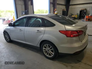 2018 Ford Focus SE z VIN 1FADP3FE9JL234158, wystawiony jako Copart lot #51788755 z przebiegiem 99 877 mil mil oraz Szkoda całkowita • Salvage title. Historia ofert i sprzedaży dostępna na DreamBid. Obrazek 2.