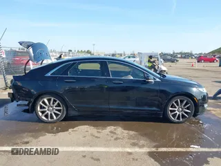 2016 Lincoln MKZ with VIN 3LN6L2G95GR632533, listed as a IAAI auction lot 42099399 with 131,639 mi miles and . Bid and sale history available at DreamBid. Image 14.