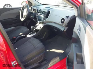 2014 Chevrolet Sonic LT with VIN 1G1JC5SH1E4227637, listed as a IAAI auction lot 40574546 with 75,055 mi miles. Bid and sale history available at carsss.com. Image 5.