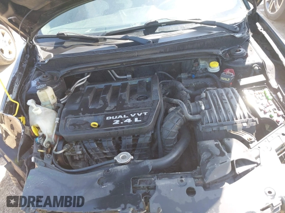2013 Dodge Avenger SXT with VIN 1C3CDZCB0DN620279, listed as a IAAI auction lot 42094597 with 129,140 mi miles and . Bid and sale history available at DreamBid. Image 10.
