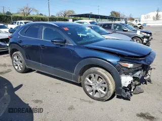 2023 Mazda CX-30 S Carbon Edition with VIN 3MVDMBCM1PM582423, listed as a Copart auction lot 47998275 with 35,412 mi miles and Salvage title. Bid and sale history available at DreamBid. Image 4.