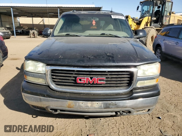 2004 GMC Yukon SLT with VIN 1GKEK13Z24J311546, listed as a Copart auction lot 73772714 with 252,403 mi miles and Salvage Title. Bid and sale history available at carsss.com. Image 5.