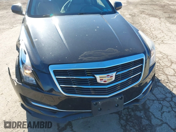 2016 Cadillac ATS Standard AWD z VIN 1G6AG5RX5G0103585, wystawiony jako IAAI lot #41439995 z przebiegiem 58 615 mil mil oraz . Historia ofert i sprzedaży dostępna na DreamBid. Obrazek 10.