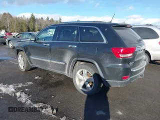 2013 Jeep Grand Cherokee Overland with VIN 1C4RJFCT3DC636378, listed as a IAAI auction lot 41477415 with 147,651 mi miles. Bid and sale history available at carsss.com. Image 3.