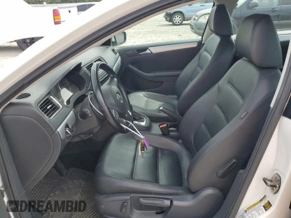 2014 Volkswagen Jetta SE with VIN 3VWD17AJ2EM391314, listed as a Copart auction lot 57357575 with 131,968 mi miles and Salvage title. Bid and sale history available at DreamBid. Image 7.