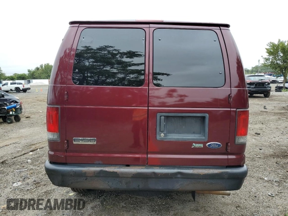 2008 Ford Econoline Passenger XL with VIN 1FMNE11W28DB28420, listed as a Copart auction lot 69724594 with 481,294 mi miles and Salvage Title. Bid and sale history available at DreamBid. Image 6.