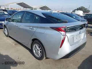 2016 Toyota Prius Two z VIN JTDKBRFU1G3016850, wystawiony jako IAAI lot #41163246 z przebiegiem 68 858 mil mil oraz . Historia ofert i sprzedaży dostępna na DreamBid. Obrazek 3.