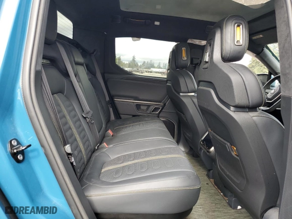 2022 Rivian R1T Launch Edition with VIN 7FCTGAAL0NN001418, listed as a Copart auction lot 75002264 with 28,835 mi miles and Salvage Title. Bid and sale history available at carsss.com. Image 10.