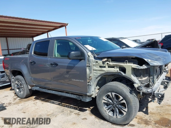 2021 Chevrolet Colorado 4WD Z71 z VIN 1GCGTDEN7M1117558, wystawiony jako IAAI lot #41911673 z przebiegiem 51 838 mil mil oraz . Historia ofert i sprzedaży dostępna na DreamBid. Obrazek 14.