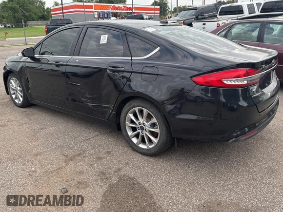 2017 Ford Fusion SE z VIN 3FA6P0HD3HR335333, wystawiony jako Copart lot #58443285 z przebiegiem 158 326 mil mil oraz Czysty tytuł • Clean title. Historia ofert i sprzedaży dostępna na DreamBid. Obrazek 3.