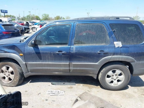 2003 Mazda Tribute LX with VIN 4F2CZ04133KM23234, listed as a IAAI auction lot 41869955 with 240,898 mi miles. Bid and sale history available at carsss.com. Image 14.