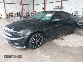 2012 Ford Mustang V6 Premium with VIN 1ZVBP8AM5C5223787, listed as a IAAI auction lot 42141944 with 73,960 mi miles. Bid and sale history available at carsss.com. Image 17.