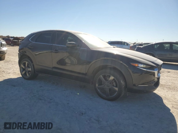 2020 Mazda CX-30 with VIN 3MVDMABL7LM135463, listed as a Copart auction lot 84154914 with 60,708 mi miles and Salvage Title. Bid and sale history available at DreamBid. Image 4.