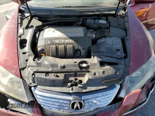 2007 Acura RL Technology z VIN JH4KB16677C004641, wystawiony jako Copart lot #59049755 z przebiegiem 176 704 mil mil oraz Szkoda całkowita • Salvage title. Historia ofert i sprzedaży dostępna na DreamBid. Obrazek 11.
