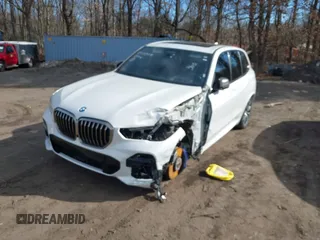 2020 BMW X5 M50i with VIN 5UXJU4C06LLE45651, listed as a IAAI auction lot 41618355 with 70,885 mi miles and . Bid and sale history available at DreamBid. Image 17.