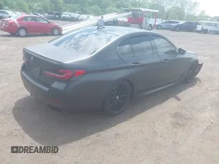 2023 BMW 5 Series M550i xDrive with VIN WBA13BK02PCN47443, listed as a IAAI auction lot 42290388 with Not provided miles and . Bid and sale history available at DreamBid. Image 4.