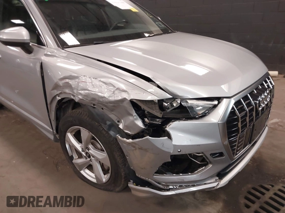 2021 Audi Q3 Premium with VIN WA1AUCF34M1078805, listed as a IAAI auction lot 42026360 with 38,473 mi miles and . Bid and sale history available at DreamBid. Image 6.