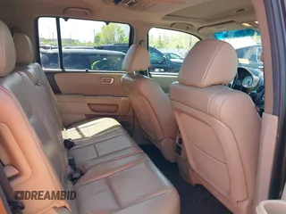 2012 Honda Pilot Touring with VIN 5FNYF4H9XCB083406, listed as a IAAI auction lot 42107651 with 217,678 mi miles. Bid and sale history available at carsss.com. Image 8.