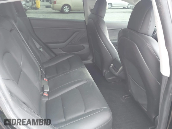 2019 Tesla Model 3 Mid Range with VIN 5YJ3E1EA3KF415601, listed as a IAAI auction lot 42125393 with 150,220 mi miles and . Bid and sale history available at carsss.com. Image 8.