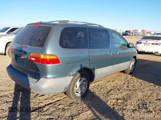 2000 Toyota Sienna CE with VIN 4T3GF19C2YU240254, listed as a IAAI auction lot 40688669 with 1 mi miles. Bid and sale history available at carsss.com. Image 4.