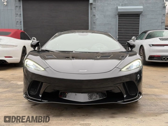 2023 McLaren GT z VIN SBM22GCA3PW002548, wystawiony jako Copart lot #52157855 z przebiegiem 779 mil mil oraz Szkody całkowita. Historia ofert i sprzedaży dostępna na DreamBid. Obrazek 14.