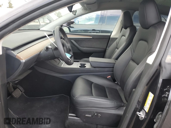 2024 Tesla Model Y with VIN 7SAYGDED1RF052031, listed as a Copart auction lot 48507865 with 5,365 mi miles and Salvage title. Bid and sale history available at DreamBid. Image 7.