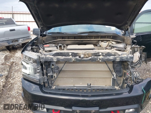 2021 Chevrolet Silverado 1500 LT Trail Boss with VIN 1GCPYFEDXMZ130455, listed as a IAAI auction lot 41140924 with 52,293 mi miles and . Bid and sale history available at DreamBid. Image 10.