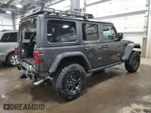 2024 Jeep Wrangler Willys with VIN 1C4PJXDG5RW312580, listed as a Copart auction lot 49144005 with 5,713 mi miles and Salvage Title. Bid and sale history available at carsss.com. Image 3.