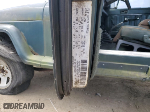 1994 Jeep Wrangler Sahara with VIN 1J4FY49S3RP422650, listed as a Copart auction lot 62353214 with 146,348 mi miles and Clean Title. Bid and sale history available at carsss.com. Image 12.