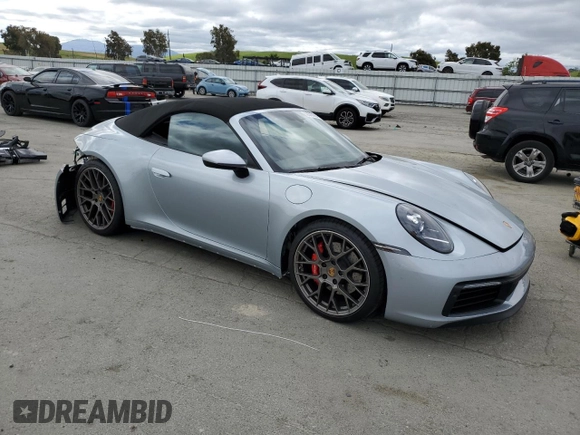 2020 Porsche 911 Carrera S z VIN WP0CB2A96LS263554, wystawiony jako Copart lot #52013384 z przebiegiem 8 702 mil mil oraz . Historia ofert i sprzedaży dostępna na DreamBid. Obrazek 4.