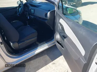 2015 Toyota Yaris L with VIN VNKJTUD38FA020465, listed as a IAAI auction lot 41416577 with 142,751 mi miles and . Bid and sale history available at DreamBid. Image 5.
