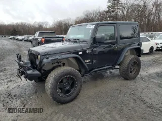 2014 Jeep Wrangler Sahara with VIN 1C4AJWBG0EL306703, listed as a Copart auction lot 51450215 with 115,932 mi miles and Salvage Title. Bid and sale history available at carsss.com. Image 1.