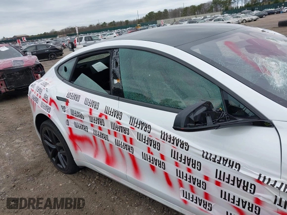 2023 Tesla Model S Plaid with VIN 5YJSA1E68PF507197, listed as a IAAI auction lot 42062258 with Not provided miles and . Bid and sale history available at DreamBid. Image 20.