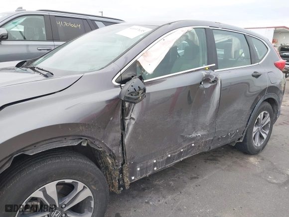 2017 Honda CR-V LX with VIN 7FARW5H32HE002156, listed as a IAAI auction lot 41697635 with 68,125 mi miles. Bid and sale history available at carsss.com. Image 6.