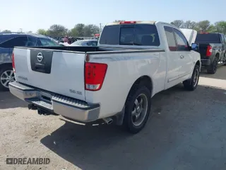 2004 Nissan Titan XE with VIN 1N6AA06A24N512320, listed as a IAAI auction lot 41824825 with 153,225 mi miles. Bid and sale history available at carsss.com. Image 4.