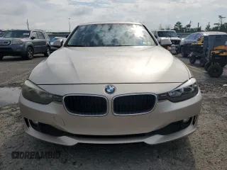 2013 BMW 3 Series 320i xDrive with VIN WBA3C3C50DF982982, listed as a Copart auction lot 62883045 with 189,875 mi miles and Clean title. Bid and sale history available at DreamBid. Image 5.