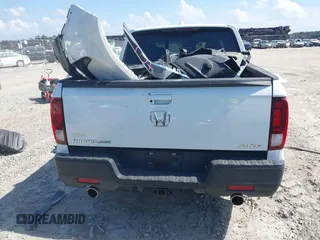 2022 Honda Ridgeline RTL with VIN 5FPYK3F51NB025152, listed as a IAAI auction lot 42325957 with 54,632 mi miles and . Bid and sale history available at DreamBid. Image 16.