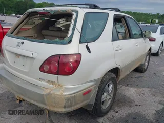2000 Lexus RX 300 z VIN JT6HF10U2Y0159504, wystawiony jako IAAI lot #42135886 z przebiegiem 180 430 mil mil oraz . Historia ofert i sprzedaży dostępna na DreamBid. Obrazek 4.