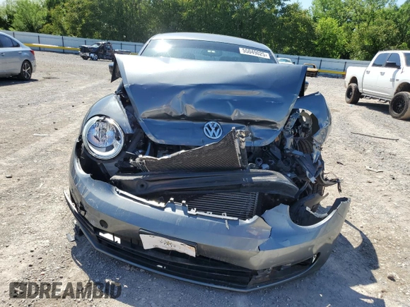2014 Volkswagen Beetle Entry z VIN 3VWF17AT0EM658329, wystawiony jako Copart lot #55049025 z przebiegiem Nie podano mil oraz Szkoda całkowita • Salvage title. Historia ofert i sprzedaży dostępna na DreamBid. Obrazek 5.
