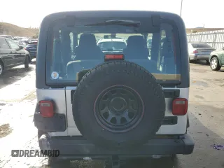 2006 Jeep Wrangler SE with VIN 1J4FA29S76P781617, listed as a Copart auction lot 85903084 with Not Provided miles and Salvage Title. Bid and sale history available at carsss.com. Image 6.